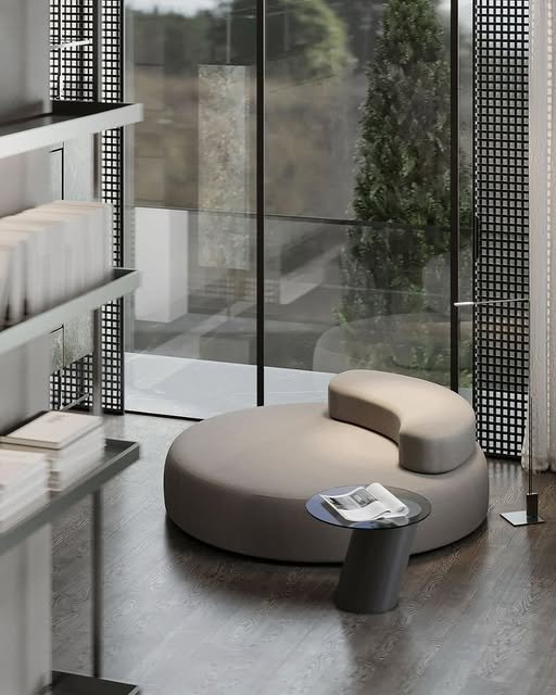 Interior lounge with curved seating and joinery detail, TASLIH project
